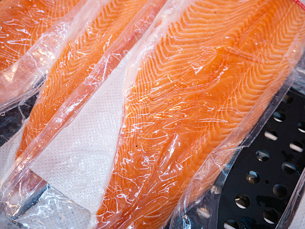 istock Salmon fillet in a vacuum package plastic bag. 2214808156