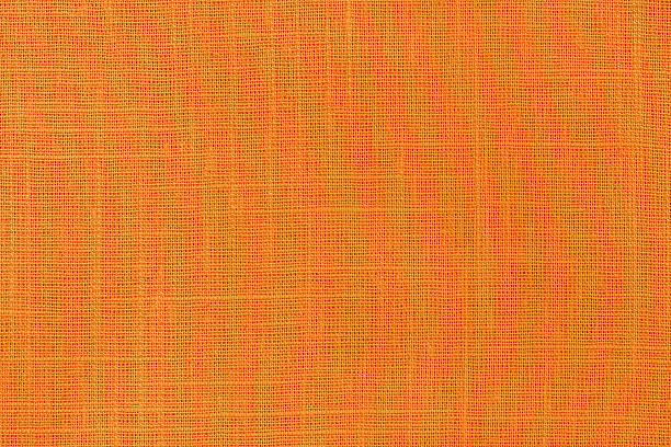 istock Orange linen fabric cloth texture for background, natural textile pattern. 2214808980