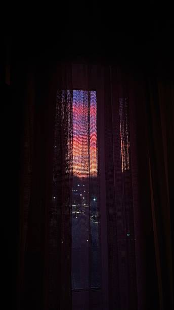 istock sunset through the window and tulle 2214813061