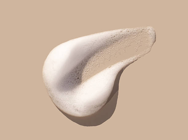 istock texture foam mousse foam cosmetic smear sample on beige background 2214813924