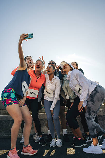 istock Joyful running club friends capturing a memorable event selfie 2214816112