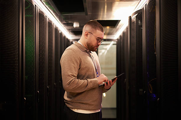 istock Man Wearing Glasses Working in Data Center 2214816790