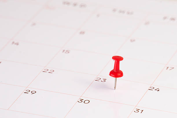 istock calendar desk with pin for background 2214819076