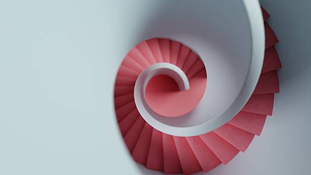 istock Sculptural Helix: The Allure of a Red Spiral Staircase 2214821797