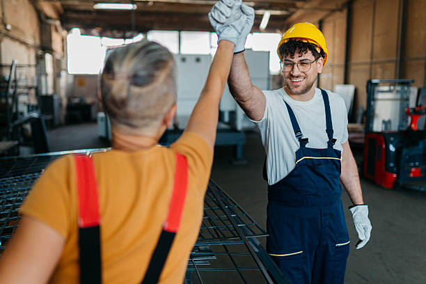 istock Working together, metal industry concept 2214822226