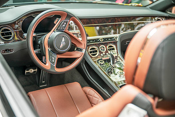 Bentley Continental GT V8 Convertible car driving on the street in Zwolle during a charity event.