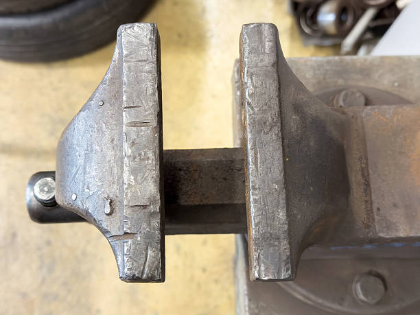 istock Close-up of a heavy duty metal vise in a workshop setting 2214822850