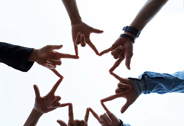 istock Teamwork Concept,Group of diversity people to greeting power tag team,Teamwork Join Hands Partnership Concept of people putting their hands together,Friends with hands showing unity 2214824778