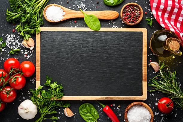 istock Food background on black. Herbs, spices and vegetables. 2214825694