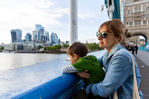 istock Mother and Son Admiring London Skyline from Tower Bridge 2214828793