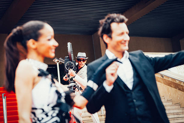istock Celebrity couple on red carpet in Cannes 2214828951