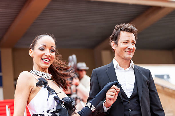 istock Celebrity couple on red carpet in Cannes 2214828986
