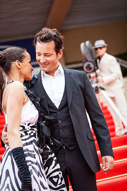 istock Celebrity couple on red carpet in Cannes 2214829040