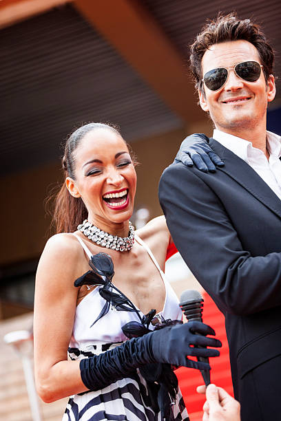 istock Celebrity couple on red carpet in Cannes 2214830034