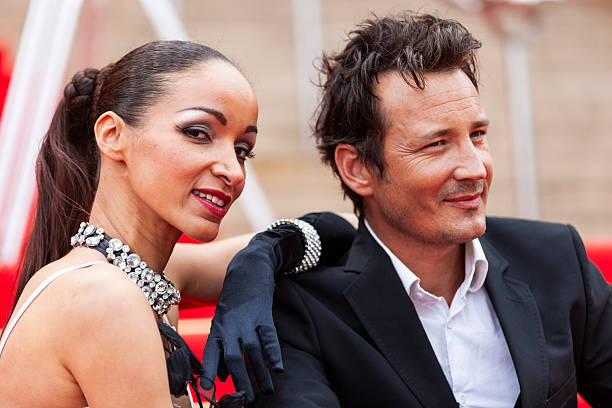 istock Celebrity couple on red carpet in Cannes 2214830274