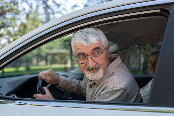 istock Senior Man Driving His Car 2214834526