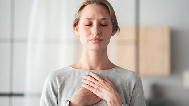istock Woman feeling grateful and thankful 2214844293
