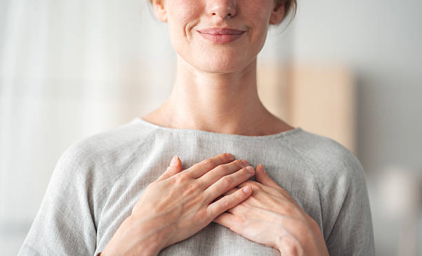 istock Woman feeling grateful and thankful 2214844315