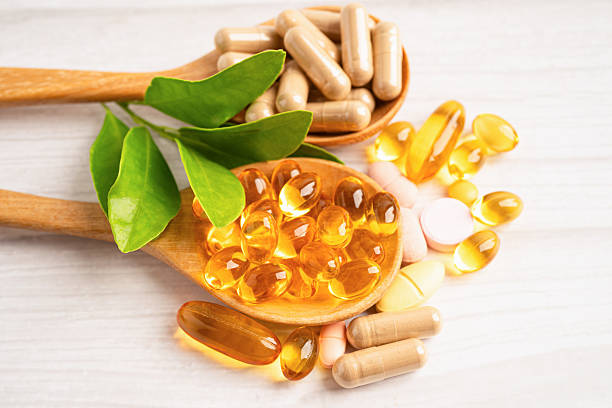 istock Alternative medicine herbal organic capsule drug herb. 2214845877