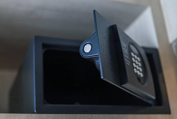 istock Small black metal safe with a lock. 2214846744
