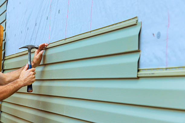 istock Home improvement project involves installing new siding on an exterior wall with a focus on detail and craftsmanship 2214850381