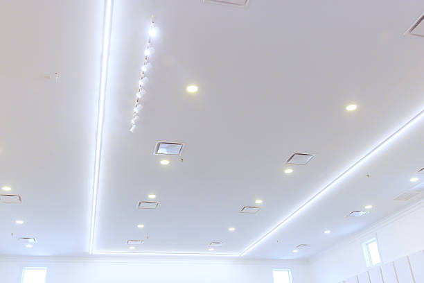 istock Modern ceiling design with bright lights and clean lines in a spacious interior setting 2214850399