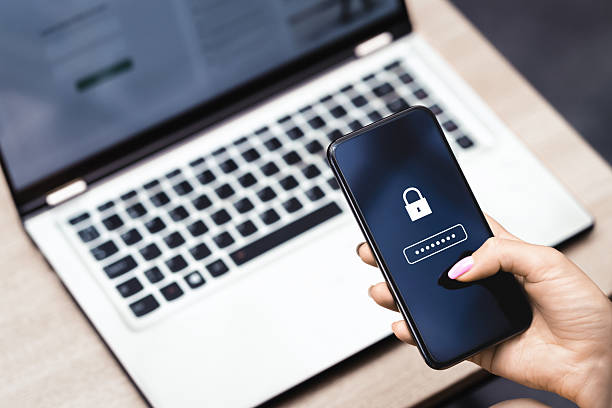 istock Password to protect data in phone. Cyber security against fraud and scam. Privacy lock online. Smartphone and laptop computer. Strong safety and safe payment. 2214857635