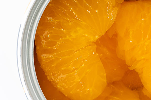 istock Close-up of canned mandarin oranges in syrup 2214861821