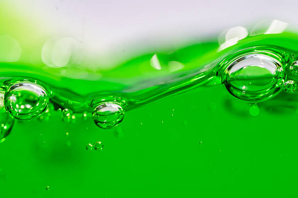 Water wave, close up of vibrant green liquid with bubbles, capturing dynamic movement and freshness. Perfect for backgrounds, beverages, or abstract concepts. soft drink
