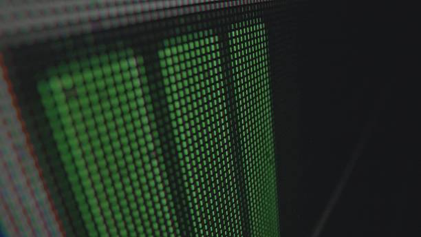 Abstract Close Up of LED Screen Matrix with Green Pixels
