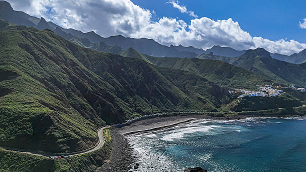 istock A mountain range with a beach in the foreground. 2214869208