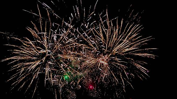 istock Fireworks on the dark sky background. Colorful Fireworks for events 2214869462
