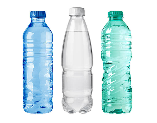 istock Three plastic water bottles showing different levels of fullness on white background 2214870053