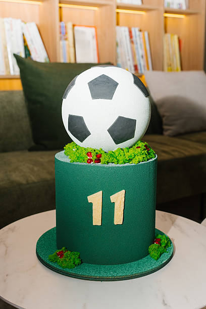 istock Green Soccer Themed Cake With Number Eleven 2214871688