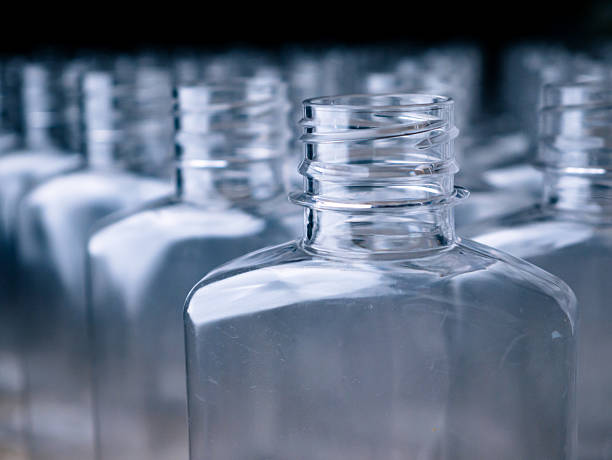 istock Row of plastic PET Bottles Production Line  Ready for Bottling. 2214878740