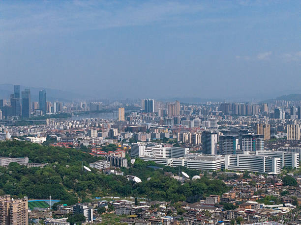 istock Urban Landscape with High-rise Buildings and Greenery 2214882101