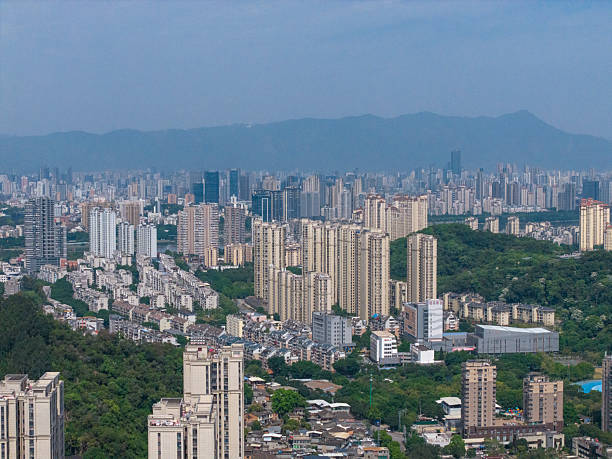 istock Urban Landscape with High-rise Buildings and Greenery 2214882102