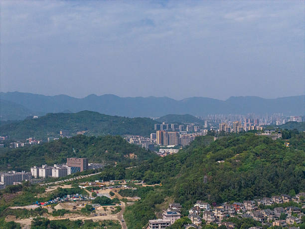 istock Urban Landscape with High-rise Buildings and Greenery 2214882135
