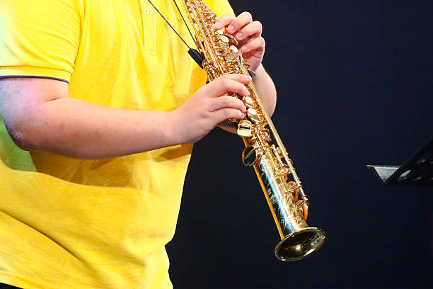 Detail of thai man playing clarinet