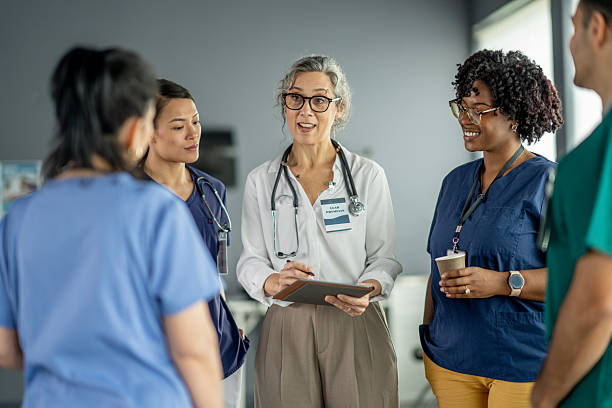 istock Medical Team Engaged in Collaborative Discussion in a Hospital Setting 2214899267