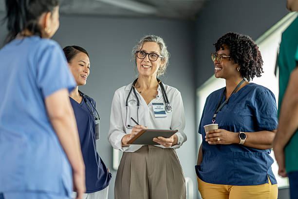 istock Medical Team Engaged in Collaborative Discussion in a Hospital Setting 2214899271