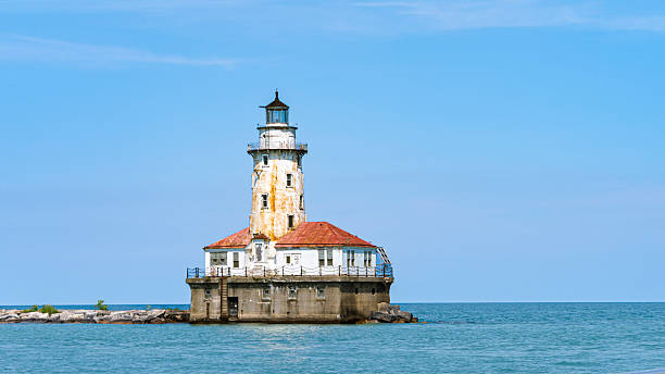 istock Chicago lighthouse guiding ships on lake michigan on a sunny day 2214900045