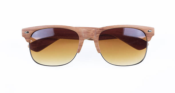 istock Sunglasses in wooden frame isolated on white background 2214900425