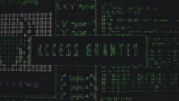 Close up view of a digital display indicating Access Granted in bright green lettering, symbolizing cybersecurity. Macro