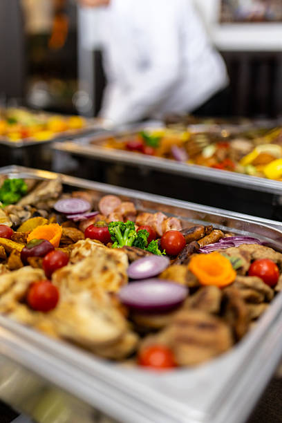 istock Colorful array of fresh vegetables and grilled meats at a festive gathering 2214903876