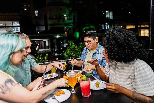 istock Friends eating on restaurant 2214909804