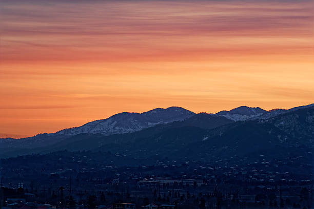 istock Snow-covered Mountains in Georgia During Sunset Create a Stunning Landscape View 2214910112