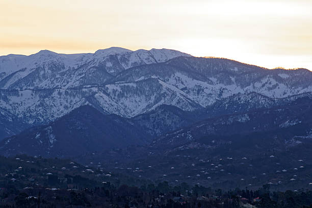 istock Snow-covered Mountains in Georgia During Sunset Create a Stunning Landscape View 2214910187