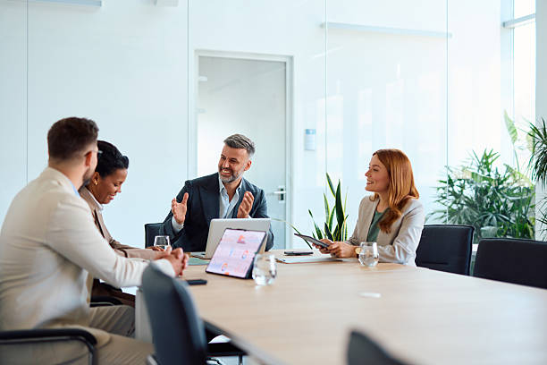 istock Business team discussing during a meeting in a modern office 2214923636