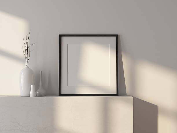 istock Black Square art poster frame mockup with passepartout standing in room with shadows from window 2214925667